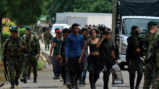 Civilians being escorted by Colombian military