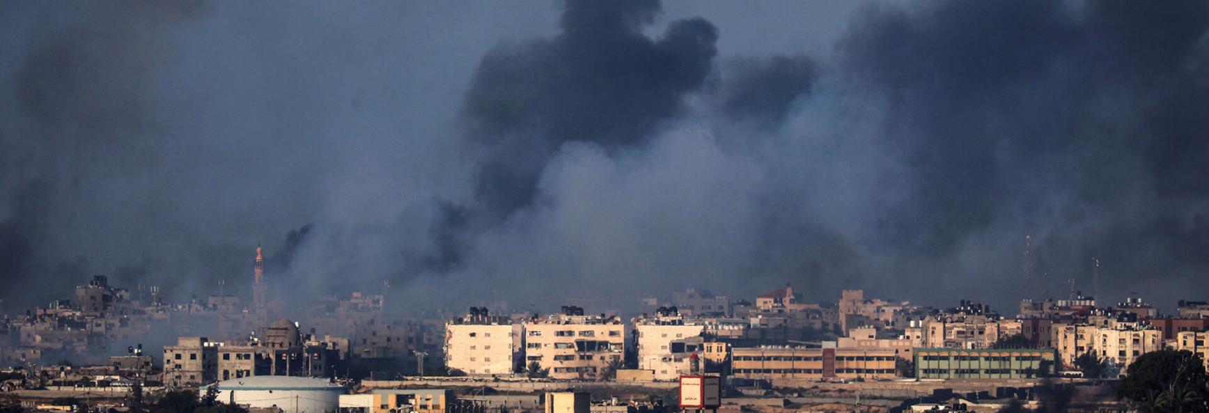 Smoke billows over buildings in Rafah in the southern Gaza Strip during Israeli bombardment on January 25, 2024, amid ongoing battles between Israel and the Palestinian militant group Hamas.