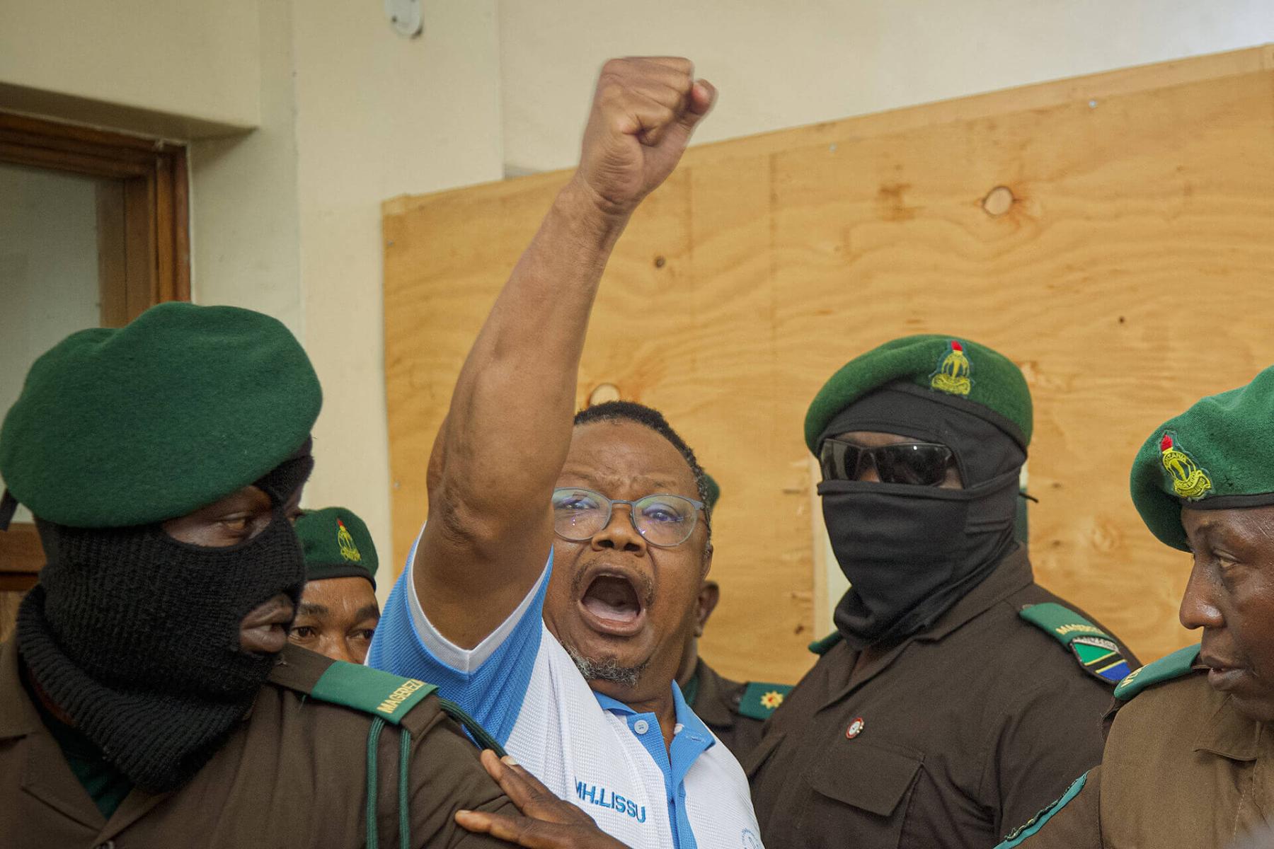 Tanzania-election-watch-3-GettyImages-2215331901-Tanzania's main opposition leader, Tundu Lissu, gestures as he enters the courtroom at Kisutu Magistrate's Court in Dar es Salaam on 19 May 2025 for his latest hearing in a treason trial in which he faces a potential death penalty. 